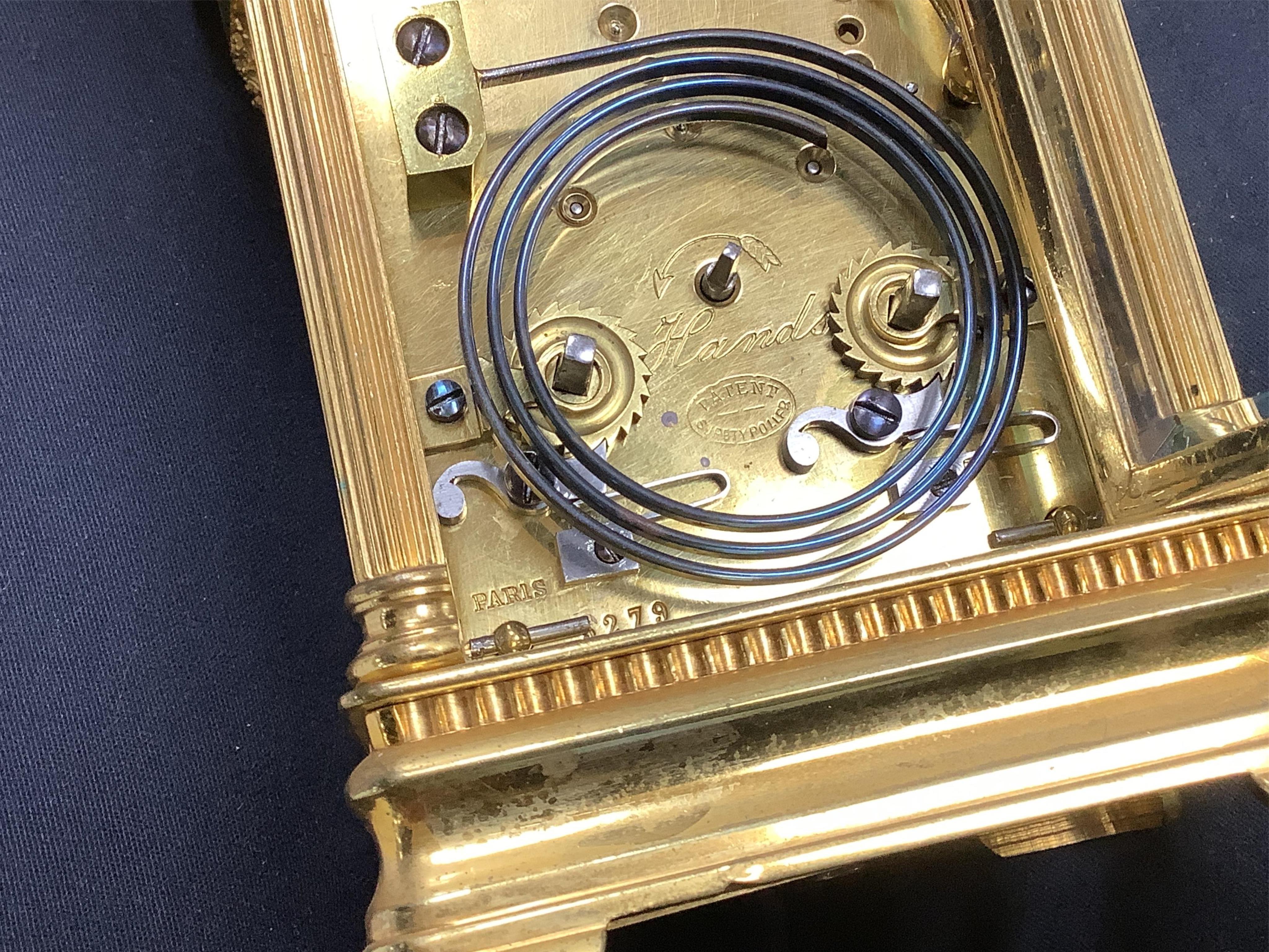 An early 20th century French brass carriage clock, gong-striking with repeat, 13cm high, 16.5cm high
